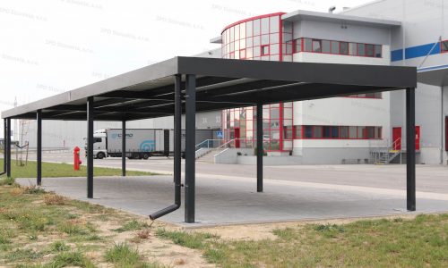 Eine große Überdachung für Raucher vor einer Firma