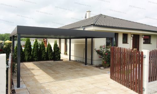 Ein Doppelcarport mit Flachdach in anthrazit von GARDEON bei einem Familienhaus